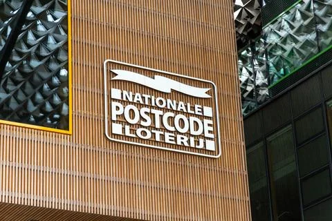 Nationale Postcode Loterij logo on headquarter building. Stock Photos