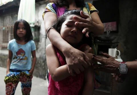 Nationwide measles response immunization program, Manila, Philippines - 13 Feb 2 Stock Photos