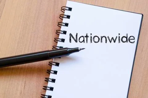 Nationwide write on notebook Stock Photos