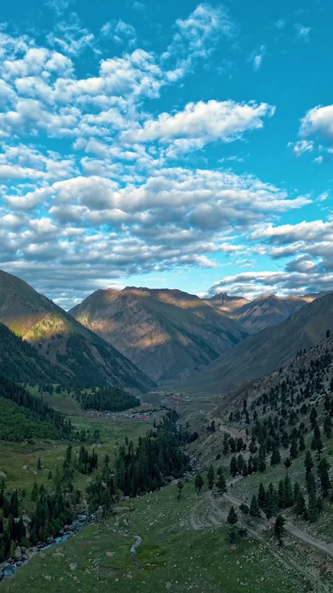 Native 4k Vertical drone timelapse of clouds moving across sky Stock Footage 327689817