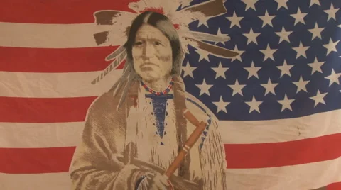 Native american on american flag Stock Footage 6577198