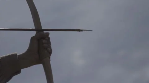 Native American Arrow - slo-mo release - Little Big Horn Indian Wars portrayal Stock Footage 169670798