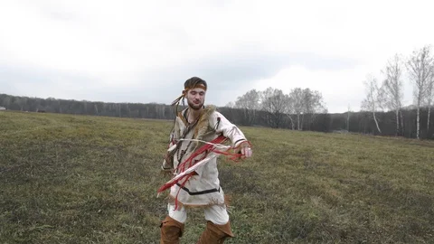 Native American dances in the field in the fall Video stock 124210539