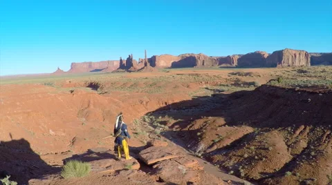 Native American desert Aerial Shot Standing on a ridge Stock Footage 60227175
