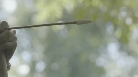 Native American Flint Arrow, drawn with bow Stock Footage 81239127