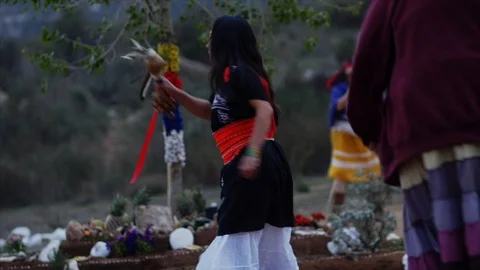 Native American Indians dance around sacred tree, meduim shot. Stock Footage 90488646