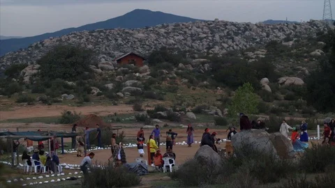 Native American Indians dance in ceremony, wide shot. Stock Footage 90398763