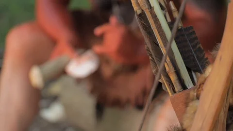 Native American makes Flints for Arrow Stock Footage 81240618