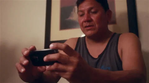 Native American man texting-indoors 스톡 동영상 35753419