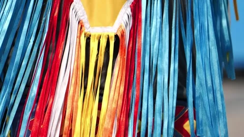 Native American powwow regalia displaying colorful ribbons and traditional Stock Footage 329566906