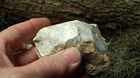 Native American, Raw chert material ECU rotated by hand Stock Footage 37120573