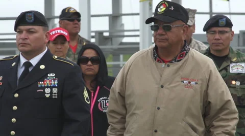 Native American veterans circle pow wow arena Stock Footage 46464981