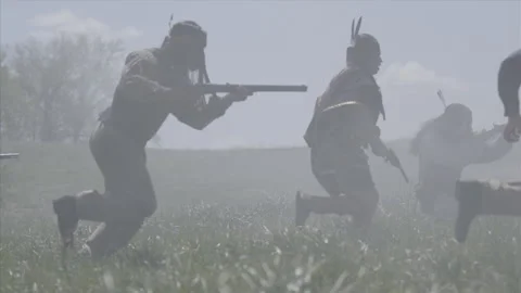 Native American Warrior Re-enactors Charge in Battle - Indian Wars Portrayal Stock Footage 220874355