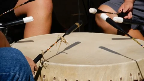 Native Americans Playing Skin Drum With Microphone With Someone Walking In F Stock Footage 121582612