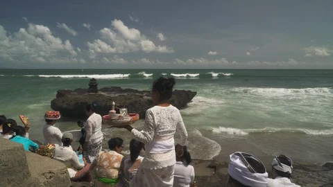 Native Balinese People Getting Ready For A Ceremonial Prayer At The Ocean Stock Footage 100451863