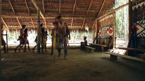 Native Brazilians doing their ritual at an indigenous tribe in the Amazon Stock Footage 54630427