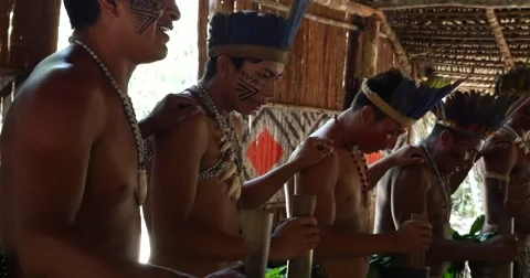 Native Brazilians doing their ritual at an indigenous tribe in the Amazon Stock-Footage 54630430