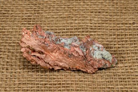 Native Copper Nugget on Burlap Background Stock Photos