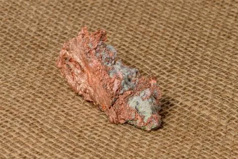 Native Copper Nugget on Burlap Background Stock Photos
