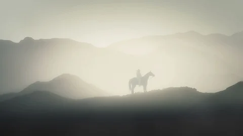 Native Indian Warrior Sitting on his Horse on a Mountain terrain Stock Footage 125284667