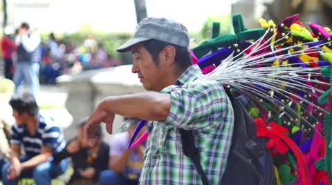 NATIVE MAN SELLING AT PARK 4K Stock Footage 59548613