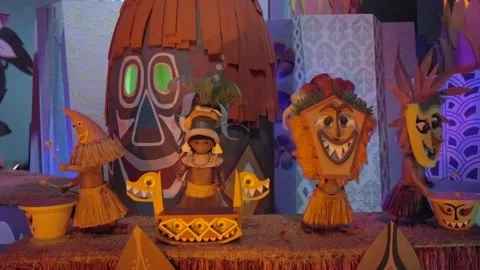 Native pacific islander peoples animatronic beating on drums Stock Footage 243294708