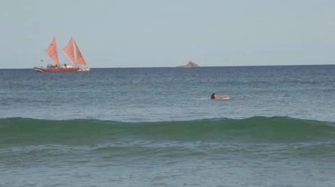 Native Polynesian Sailing Canoe Sails close to shore Stock Footage 53291918