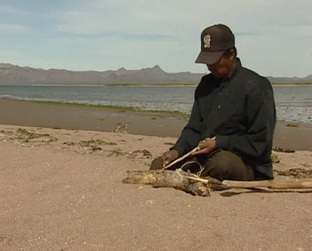 Native Seri making a lance in Tiburon island Stock Footage 36449744