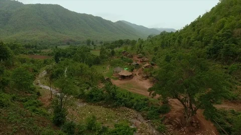 Native valley homes and stream, Kalaw, Myanmar Stock Footage 111784084