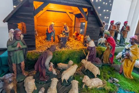Nativity scene figures with sheep and stable, a traditional Christmas display Stock Photos