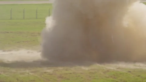 The NATO tank T-72 fire a shot with camera shaking in the dust to the enemy Stock Footage 337204039
