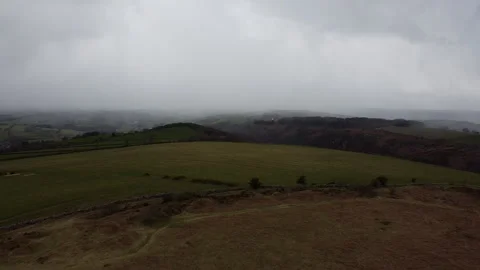 Nattadon Common Ramparts pulling back drone shot. Stock Footage 151995658