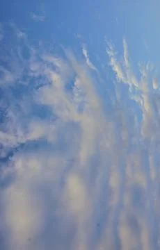 Natural altocumulus cloud formation spreading across the vast expanse Stock Photos