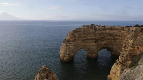 Natural arch, cliff, ocean Stock Footage 253708153