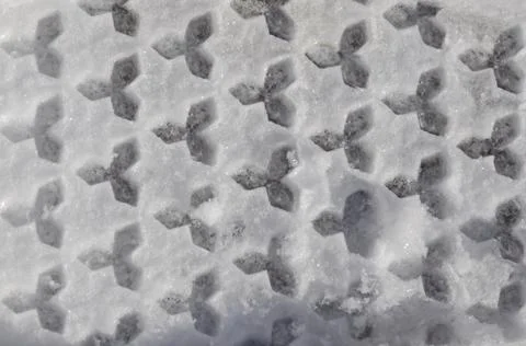 Natural authentic snow background with figures in winter Stock Photos