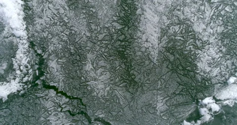 Natural background and patterns. Drone rises above the frozen crystal ice of the Stock Footage 104123262