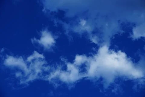 Natural background of blue sky and beautiful cloud. Selective focus Stock Photos
