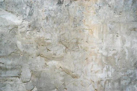 Natural background from the gray plaster with a rough texture Stock Photos