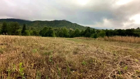 Natural Background. Moving Clouds. Mountain View Cloudy Day. Field And Mountain. Stock Footage 151204094