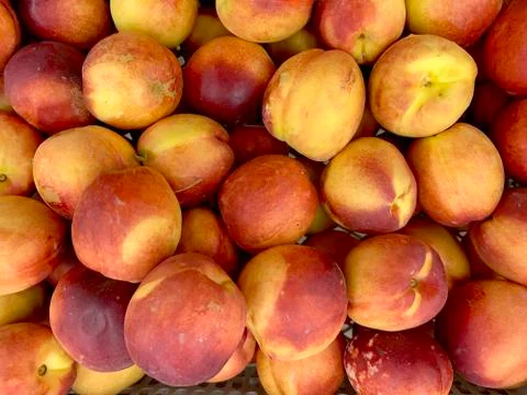 Natural background nectarines in boxes, selective focus Stock Photos