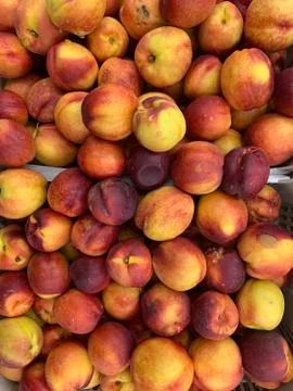 Natural background nectarines in boxes, selective focus Stock Photos