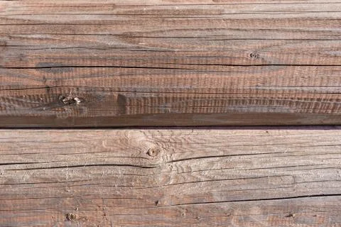 Natural background pattern of log wall for your design. Old cracked weathered Stock Photos