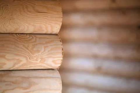 Natural background pattern of log wall. Construction of houses made of wood,  Stock Photos