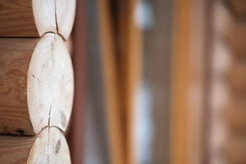 Natural background pattern of log wall. Construction of houses made of wood,  Stock Photos