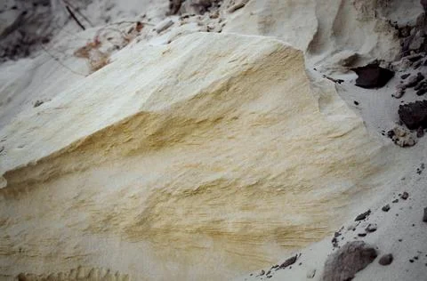 The natural background is the texture of sand. Sandy hill with traces of weat Stock Photos