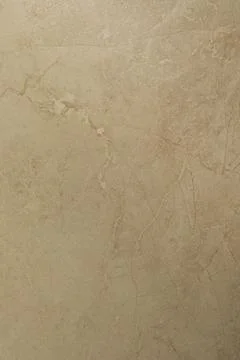Natural beige stone surface with subtle textures and patterns ideal for interior Foto stock