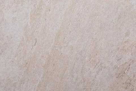 Natural beige stone surface with subtle textures and patterns suitable for Foto stock
