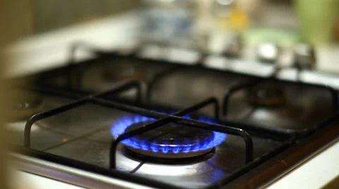 Natural blue gas loop in stove burner, soft focus Stock Footage 34035001