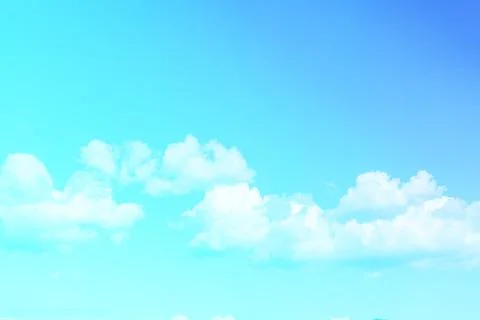 Natural blue gradient sky background with white clouds Stockfoto's