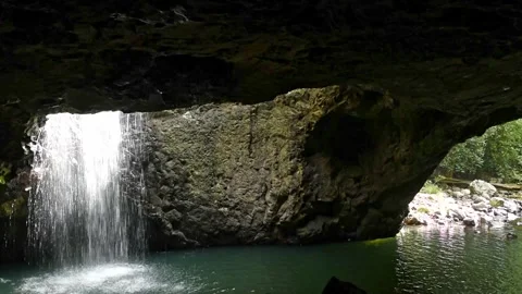 Natural Bridge, Springbrook NP, Australia. Waterfall in the roof of a cave. Stock Footage 250141213